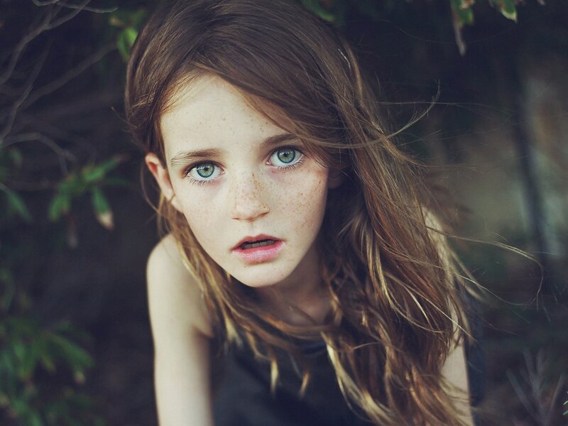 girl with freckles and green eyes