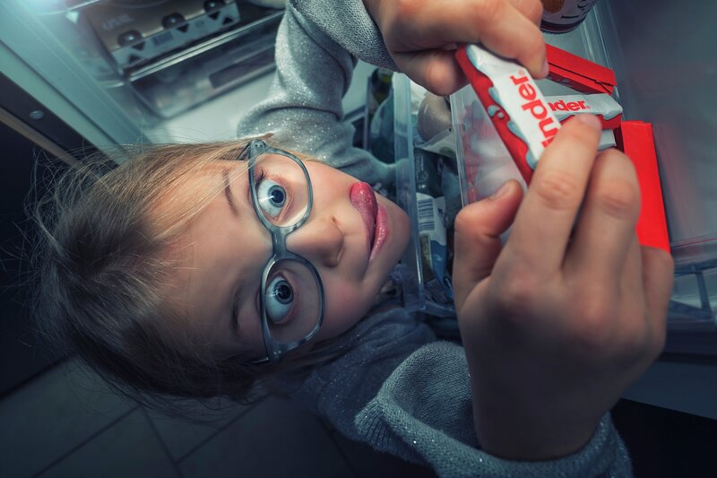 Girl with Glasses in Fridge