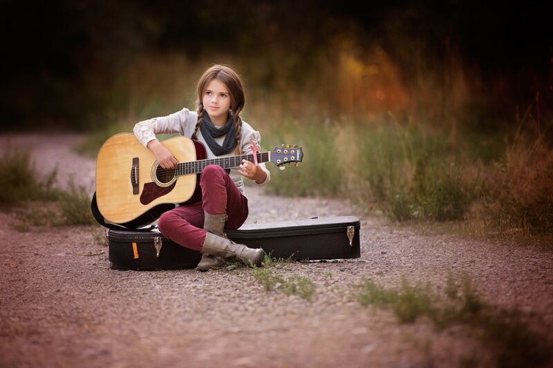Girl with Guitar — Brown, Serene