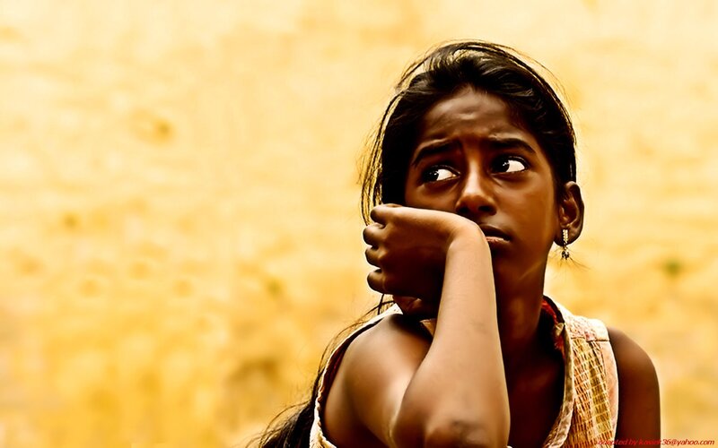 girl with hand on chin
