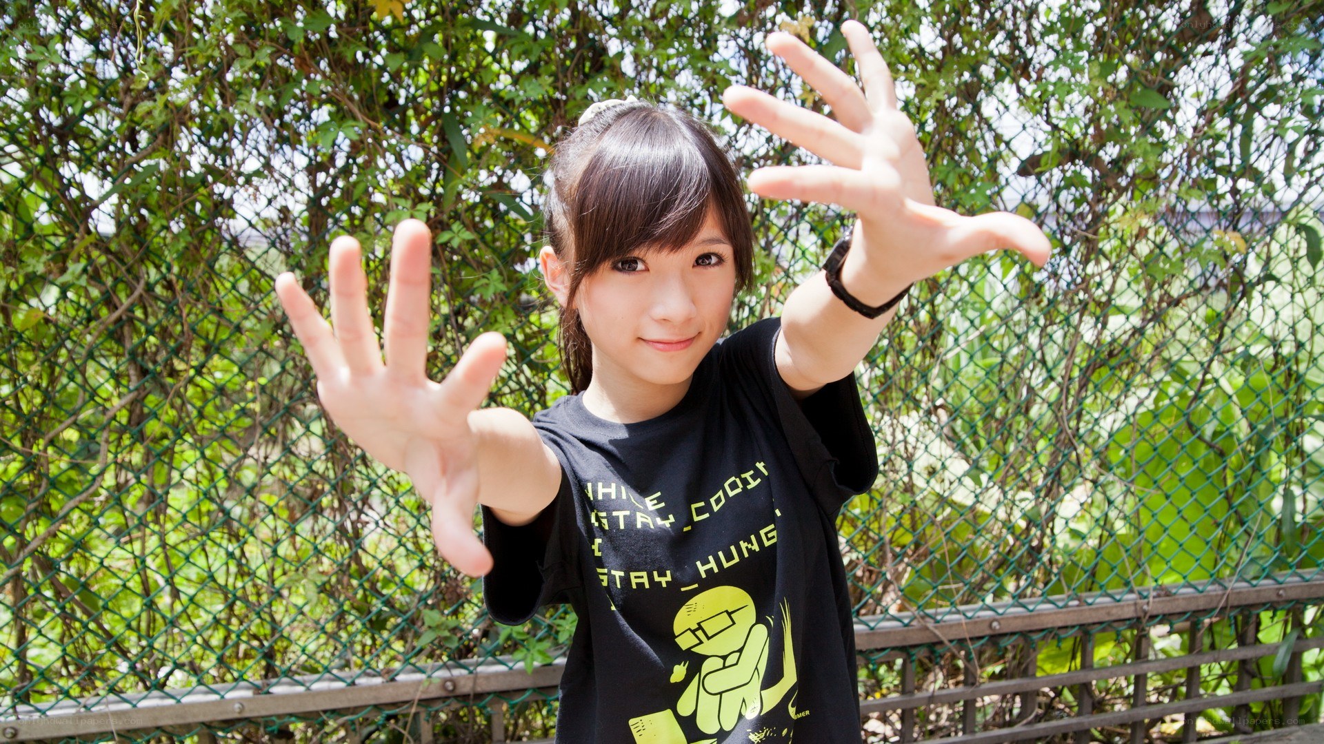 girl with hands outstretched