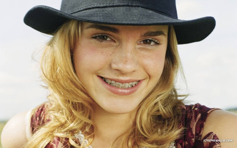 girl with hat and braces