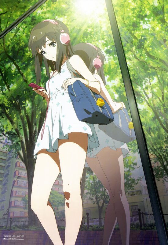 Girl with headphones in park
