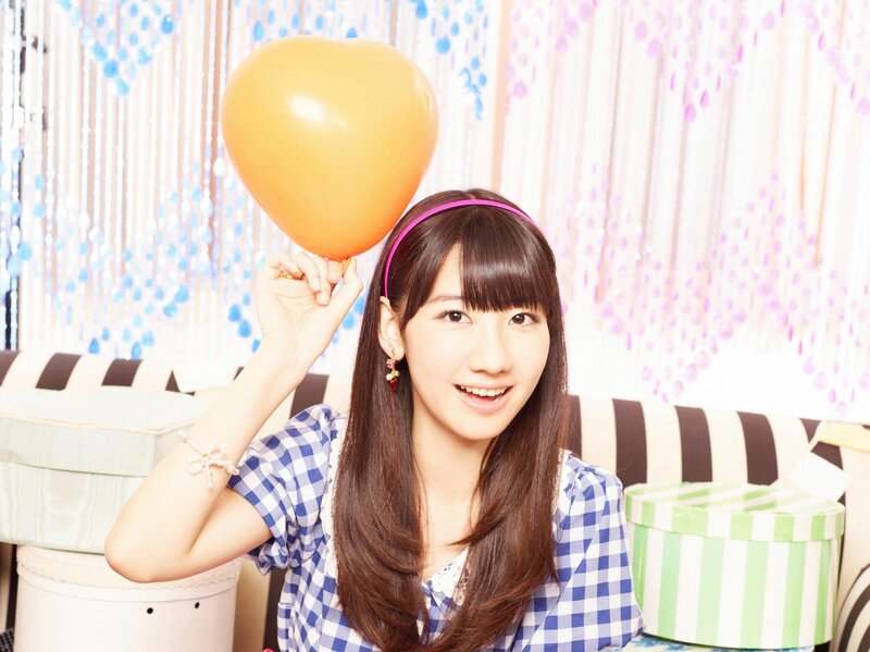 Girl with heart balloon