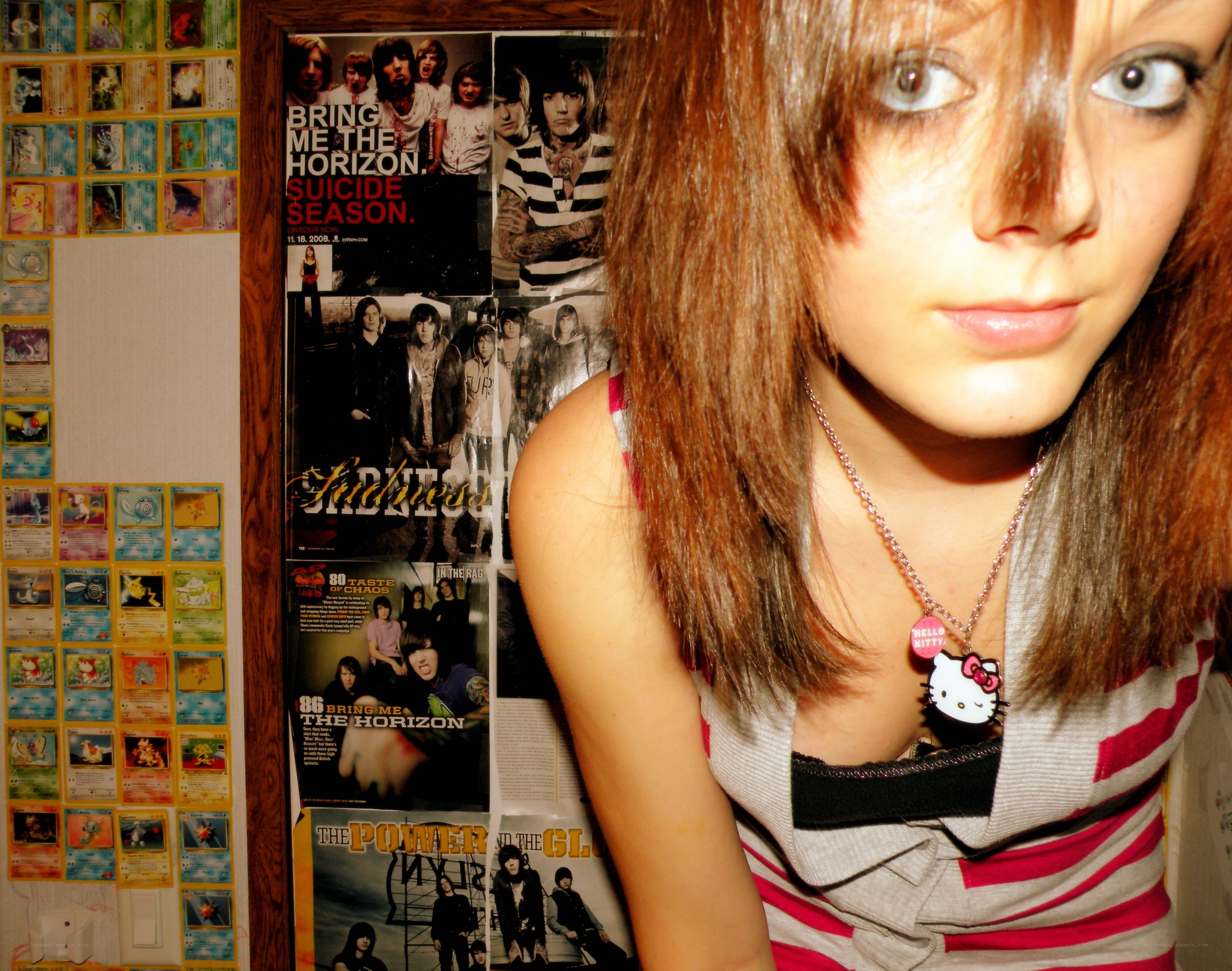 girl with hello kitty necklace
