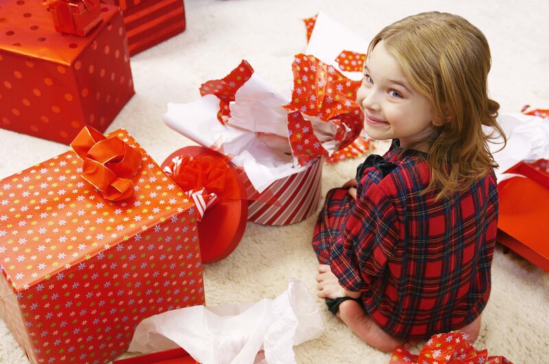 girl with holiday gifts