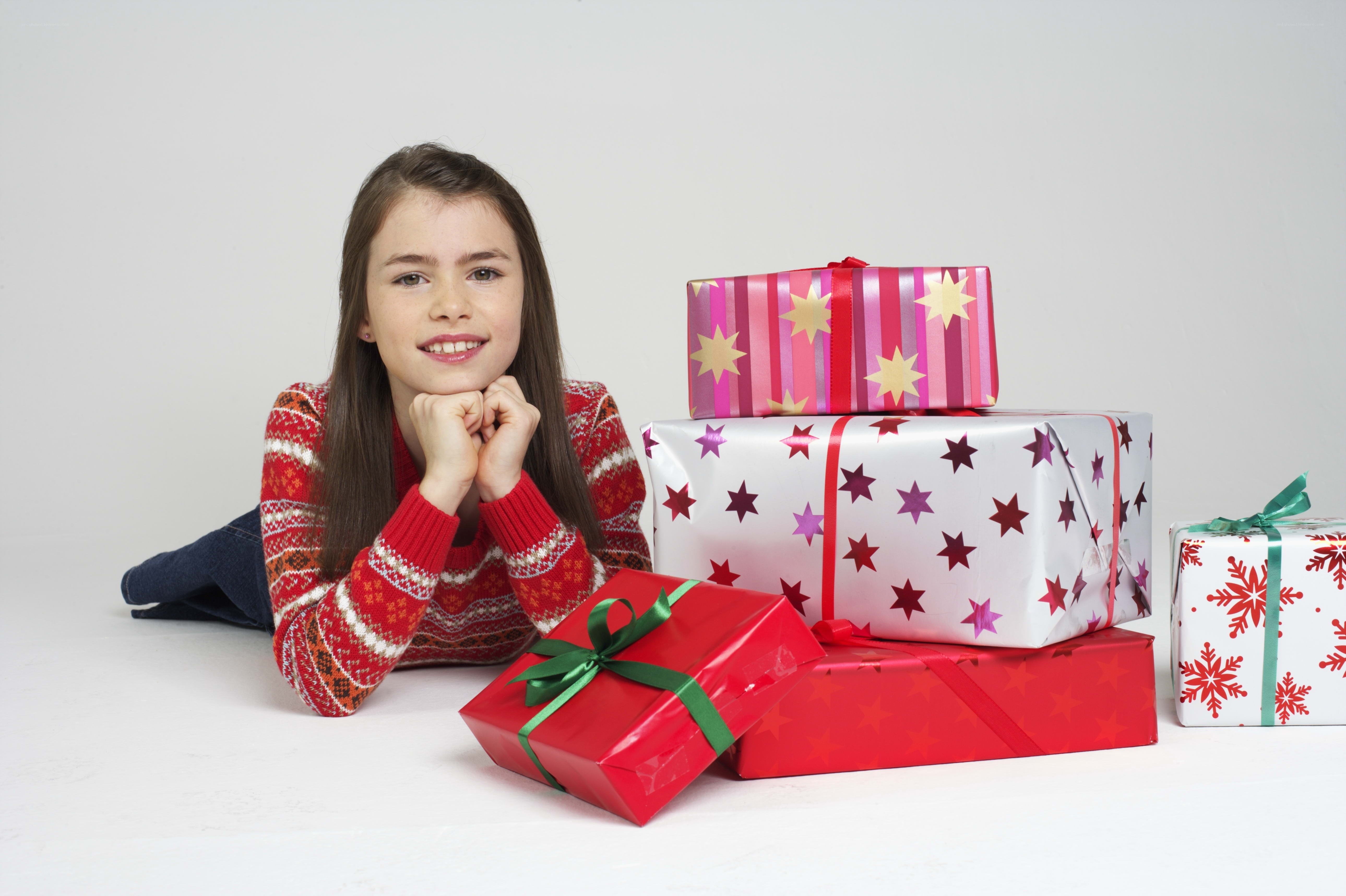 girl with holiday gifts