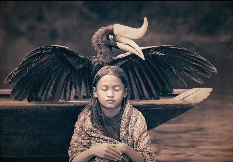 Girl with Hornbill Bird
