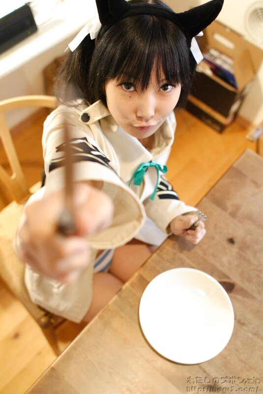 girl with knife pointing at camera