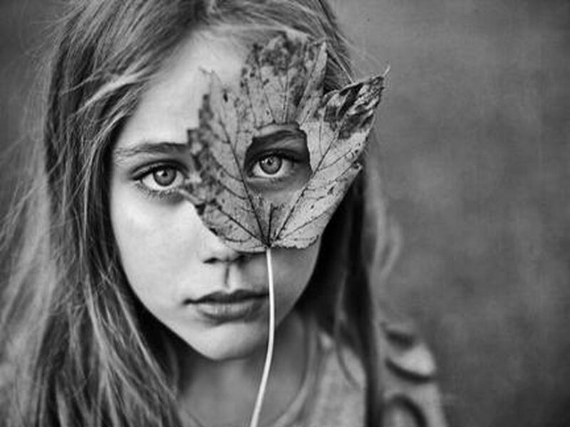 Girl with Leaf over Face