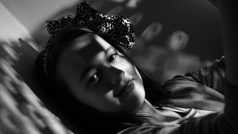girl with leopard bow in black and white