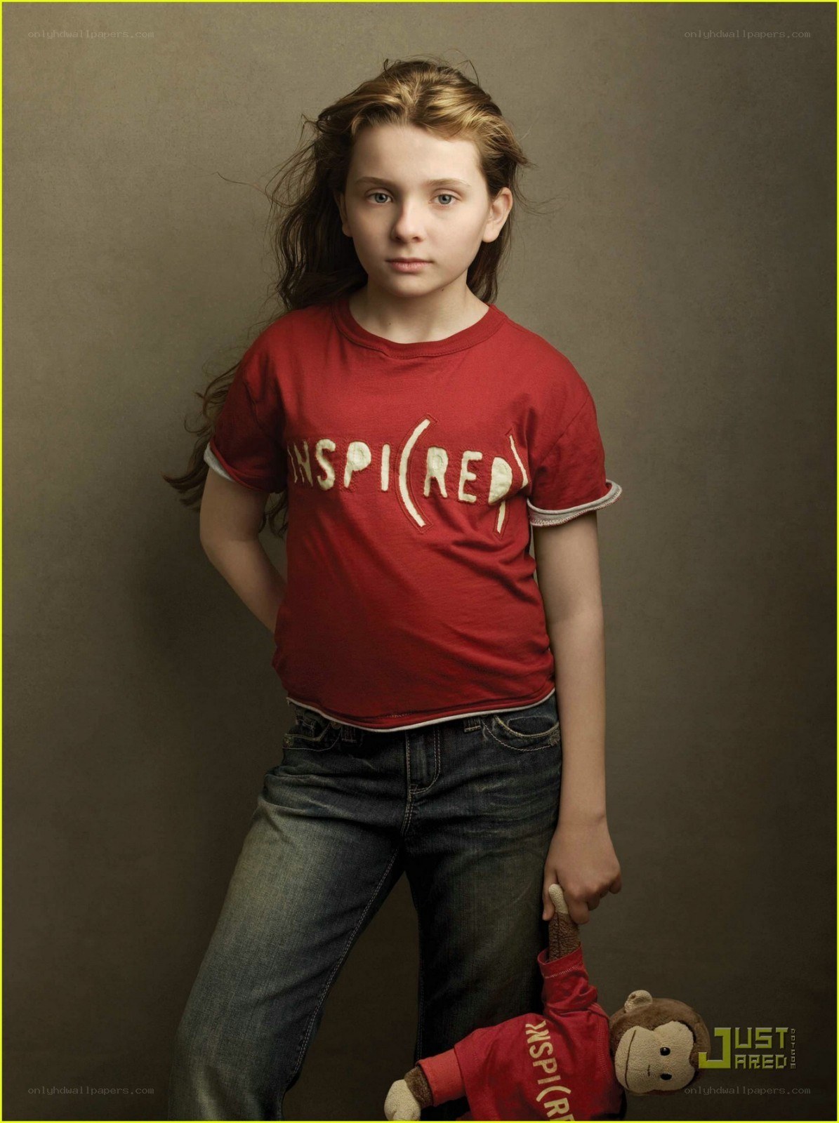 girl with monkey toy