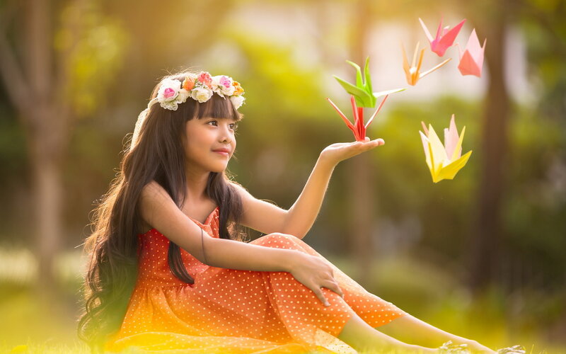 Girl with Origami Cranes