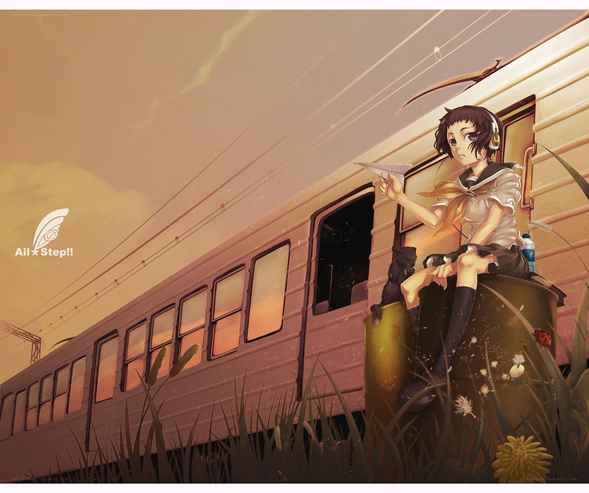 Girl with paper airplane on train