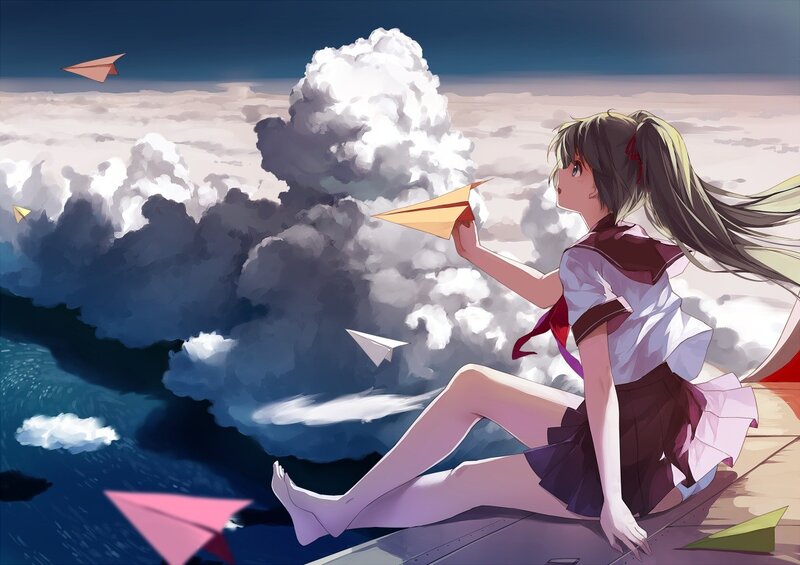 Girl with paper airplanes in sky