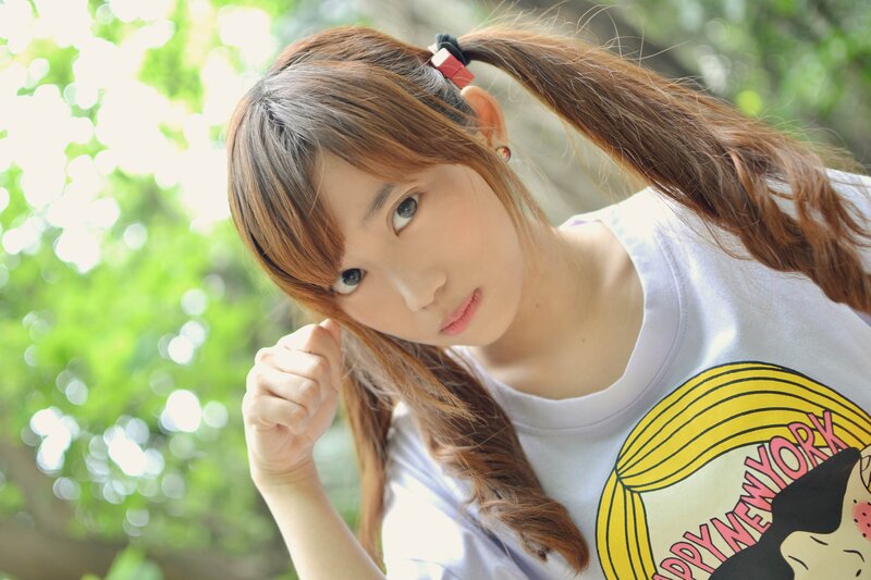girl with pigtails outdoors