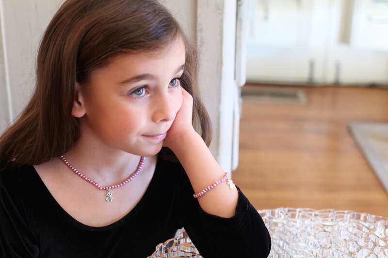 Girl with Pink Beads