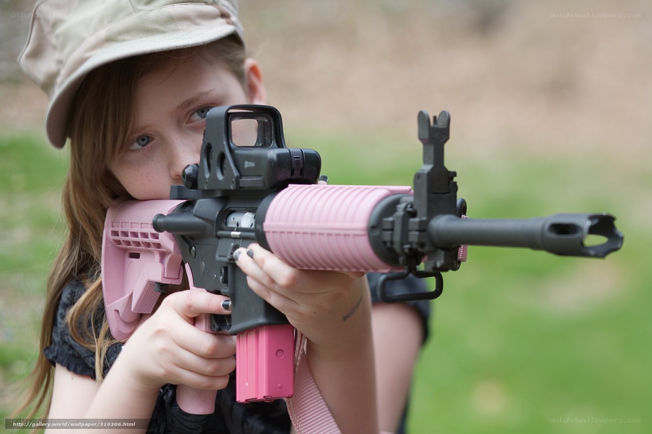 girl with pink rifle