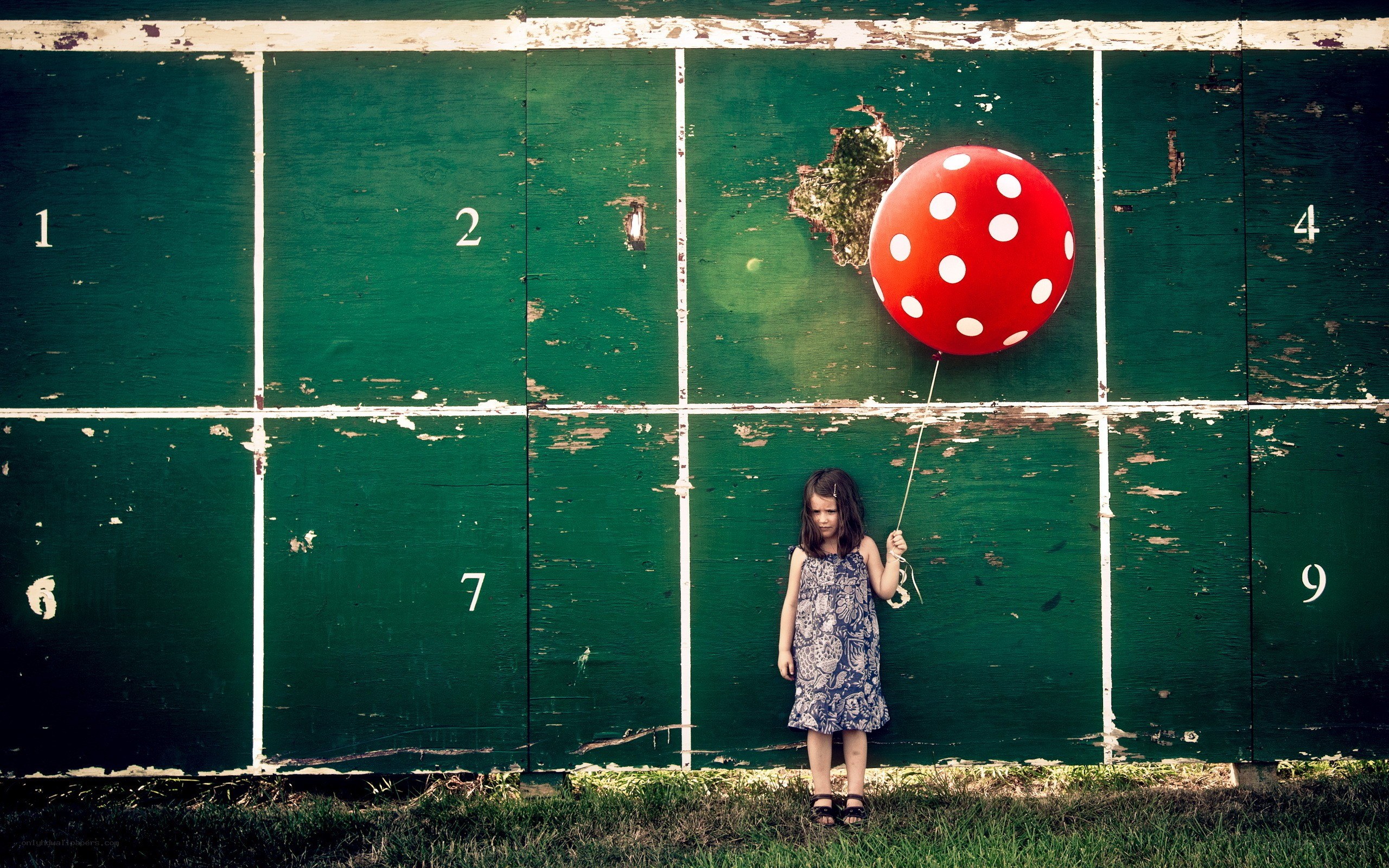 Girl with red balloon