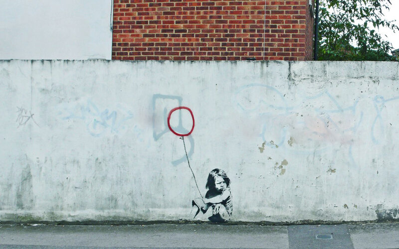 Girl with red balloon graffiti