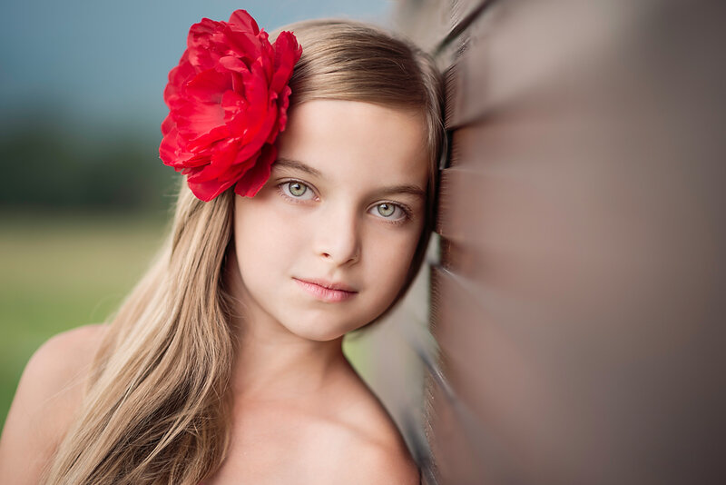 Girl with Red Flower — Calm