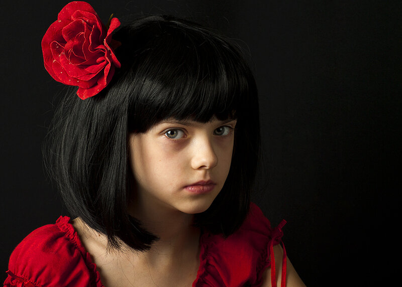 Girl with Red Flower