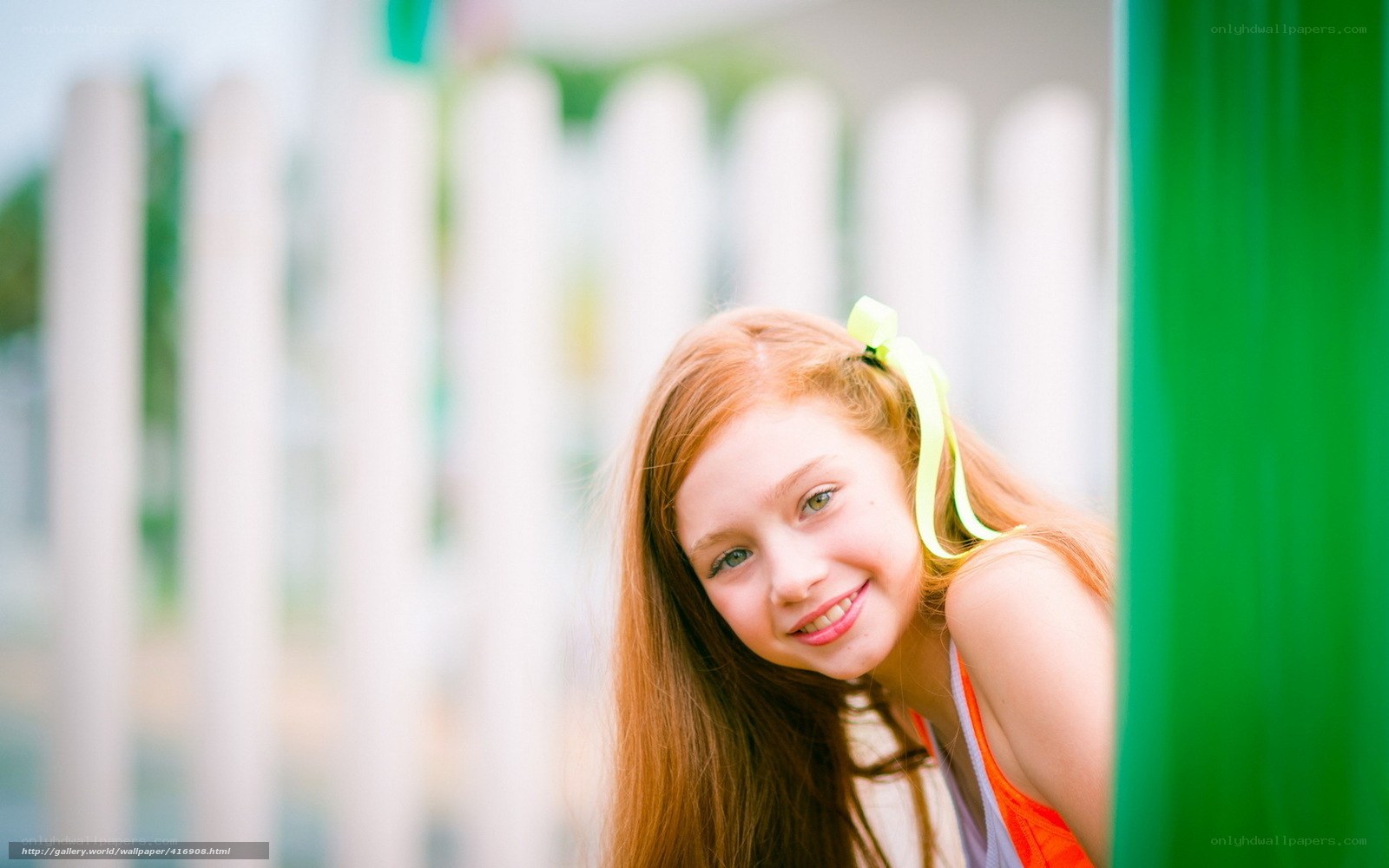 girl with red hair smiling