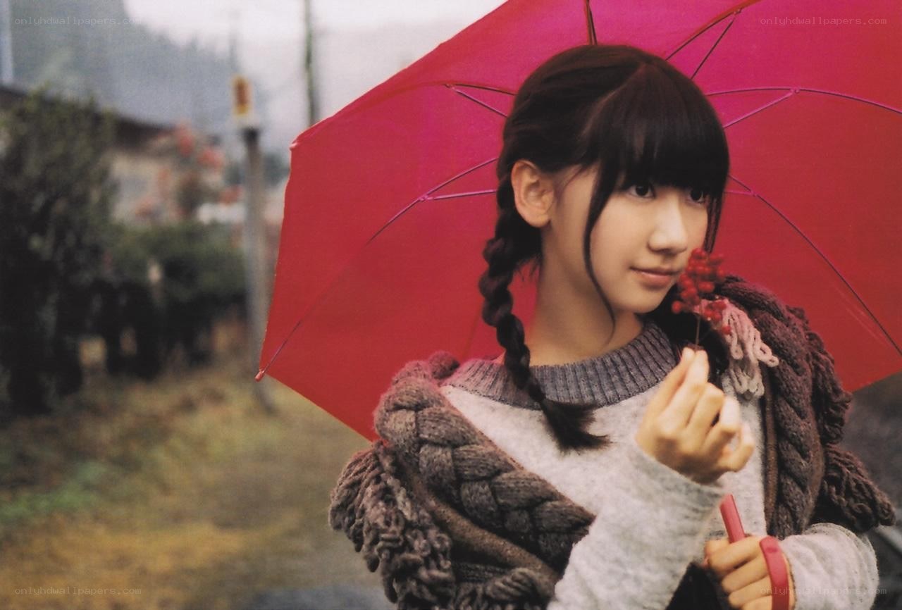 Girl with red umbrella