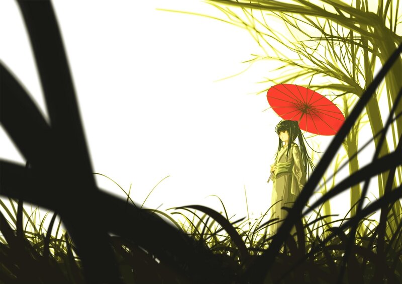 girl with red umbrella in grass