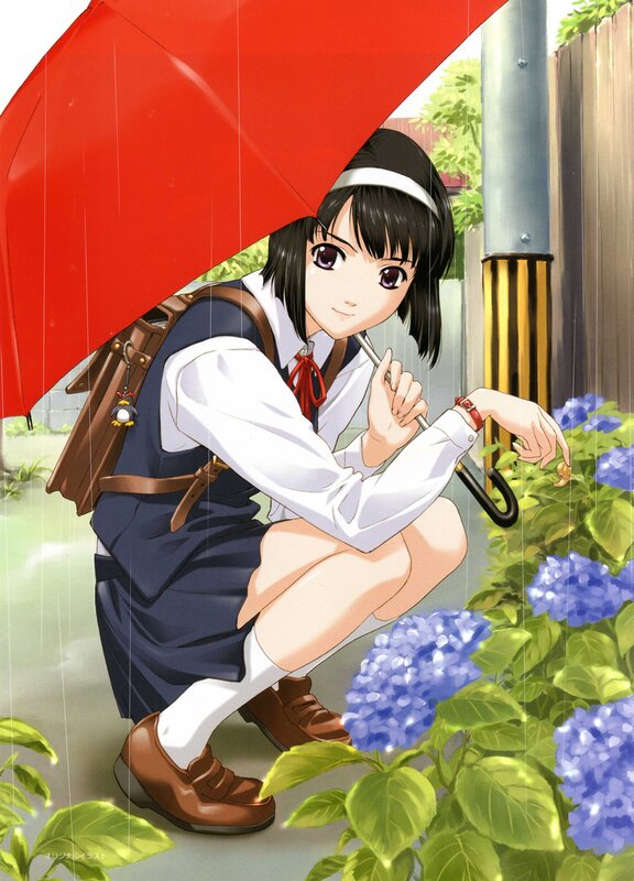 Girl with red umbrella in rain