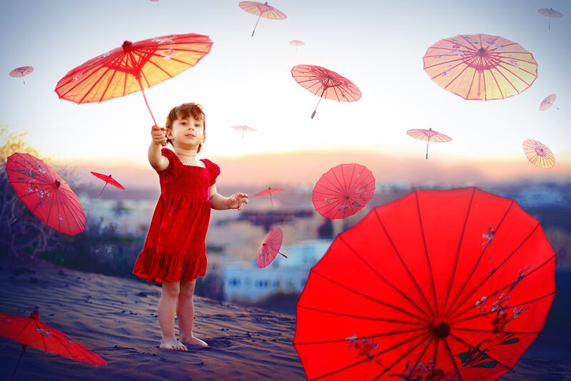 Girl with Red Umbrellas