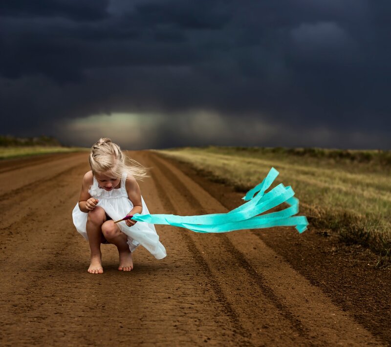 Girl with Ribbons on Road