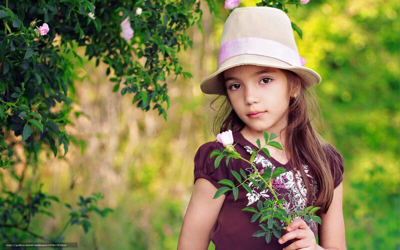 girl with rose in garden