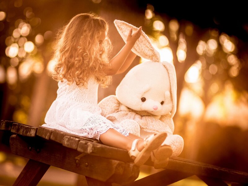 Girl with Stuffed Rabbit