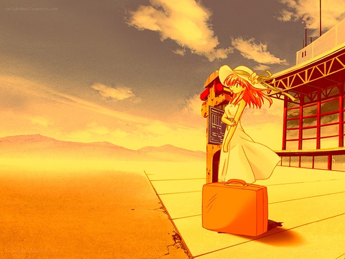 girl with suitcase at station