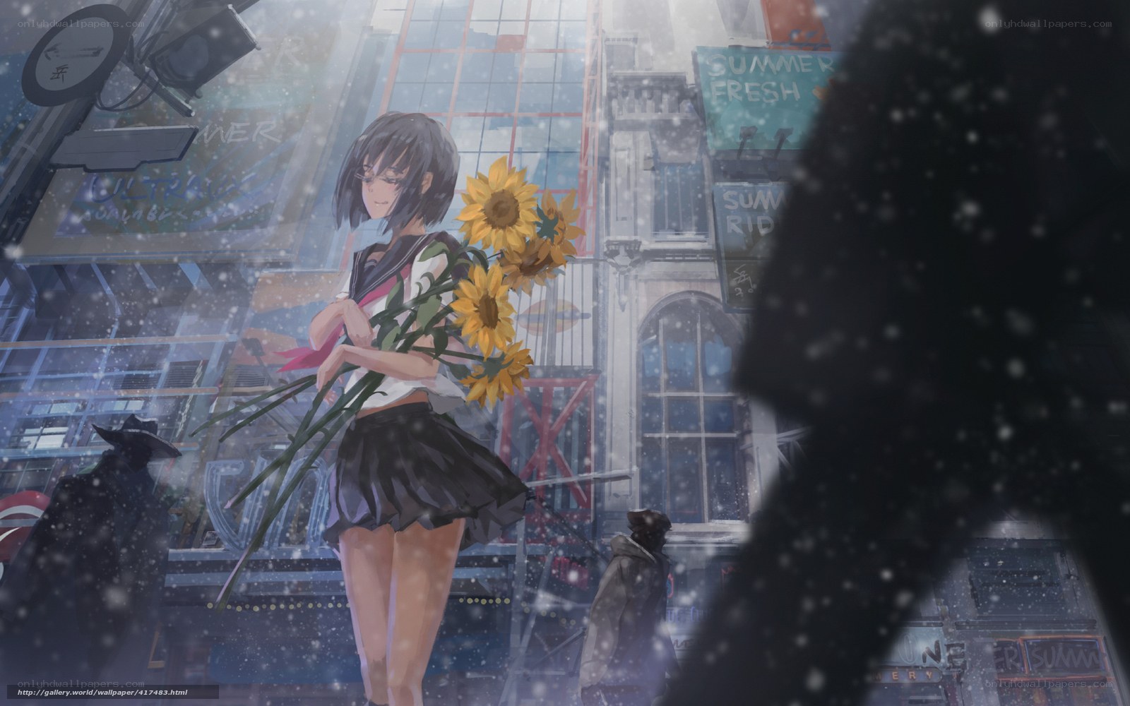 Girl with sunflowers in snow