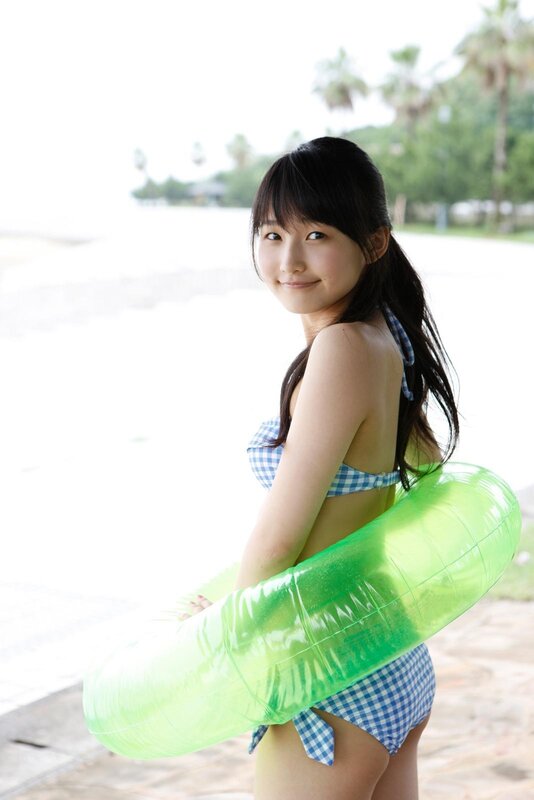 Girl with swim ring at beach