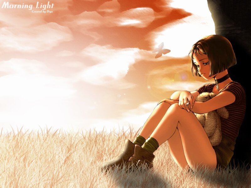 Girl with teddy bear in field