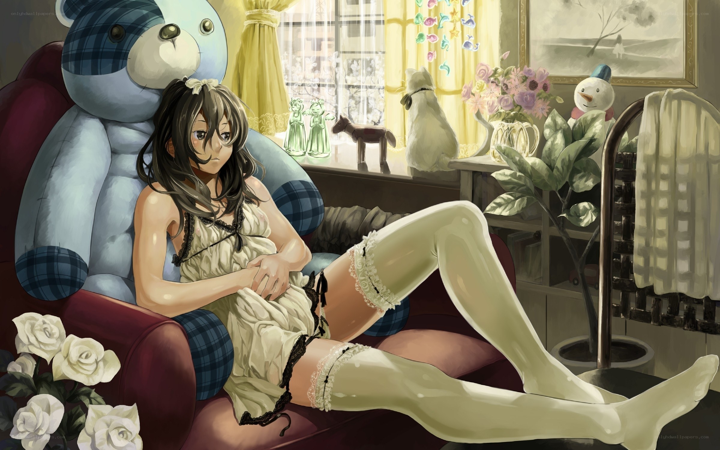 Girl with teddy bear in room