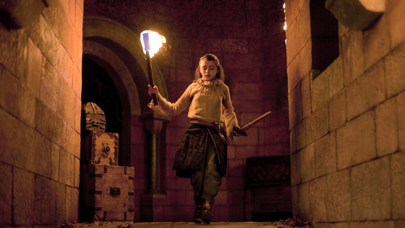 girl with torch in dungeon