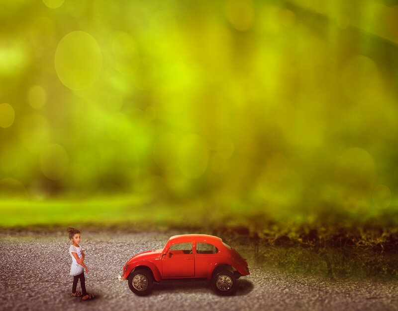 Girl with Toy Car