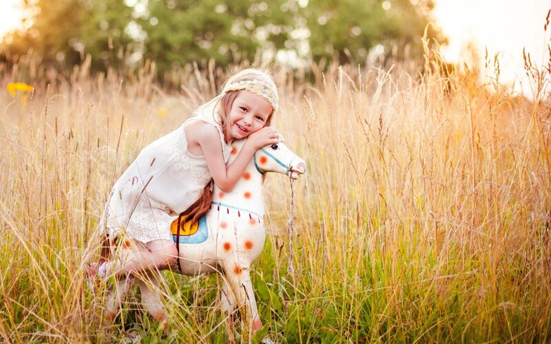 Girl with Toy Horse