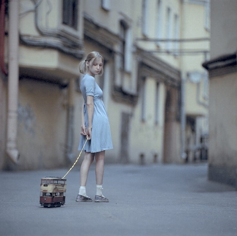 Girl with Toy Tram