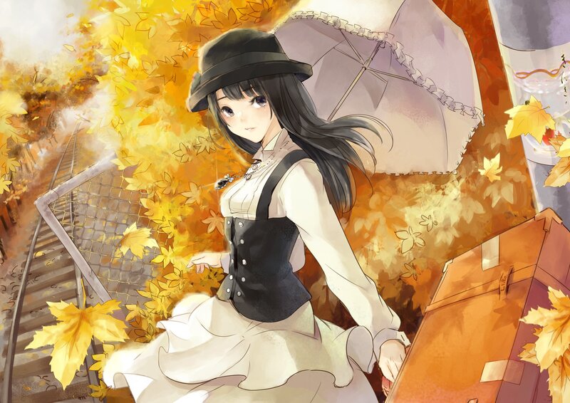 Girl with umbrella in autumn