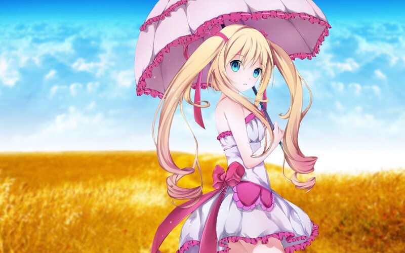 girl with umbrella in field