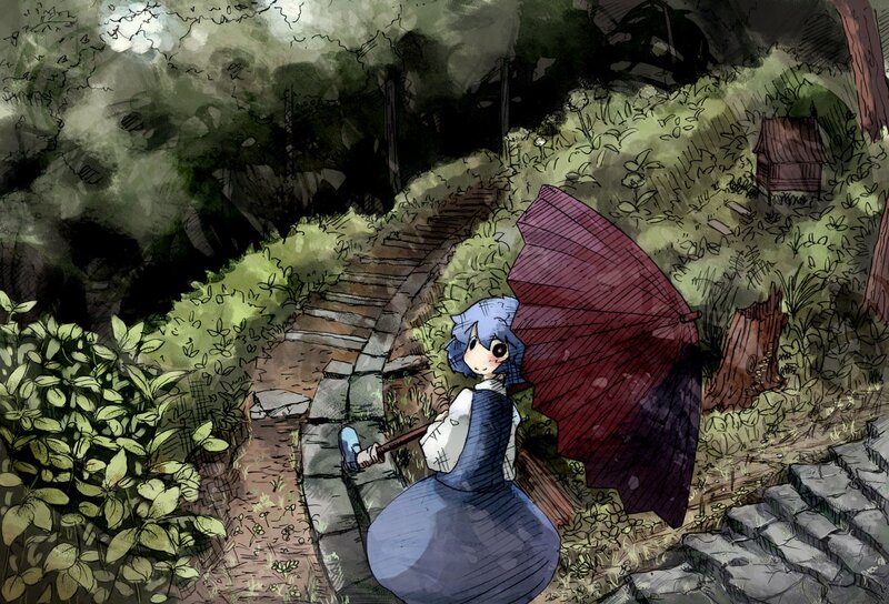 Girl with umbrella in forest