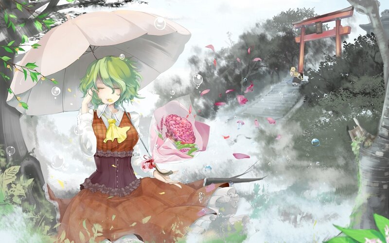Girl with umbrella in garden