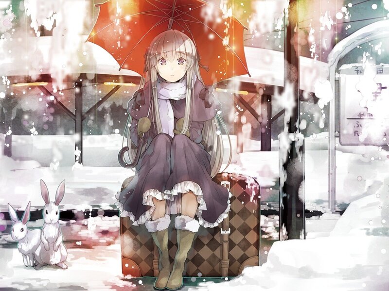 girl with umbrella in snow