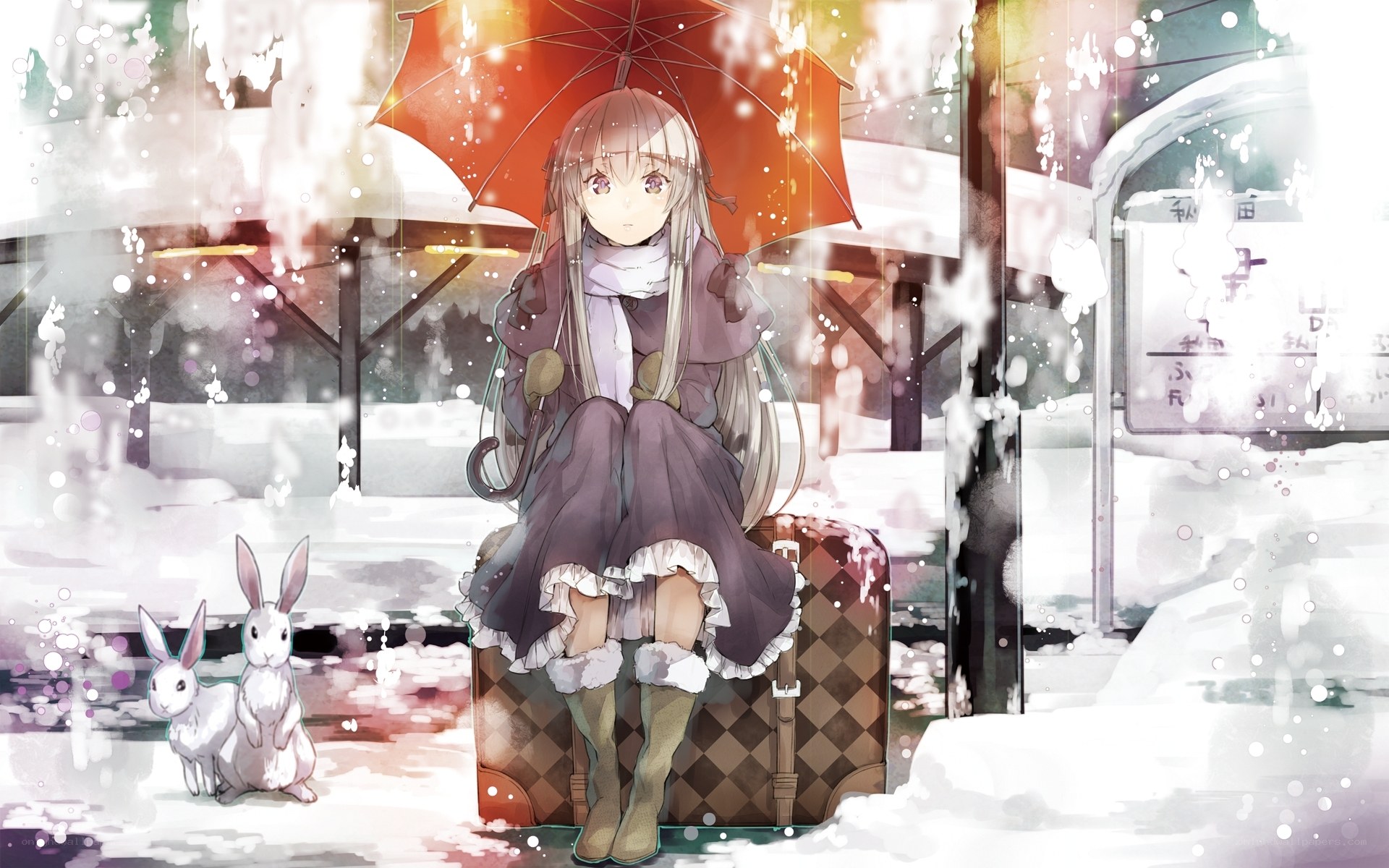 Girl with umbrella in snow