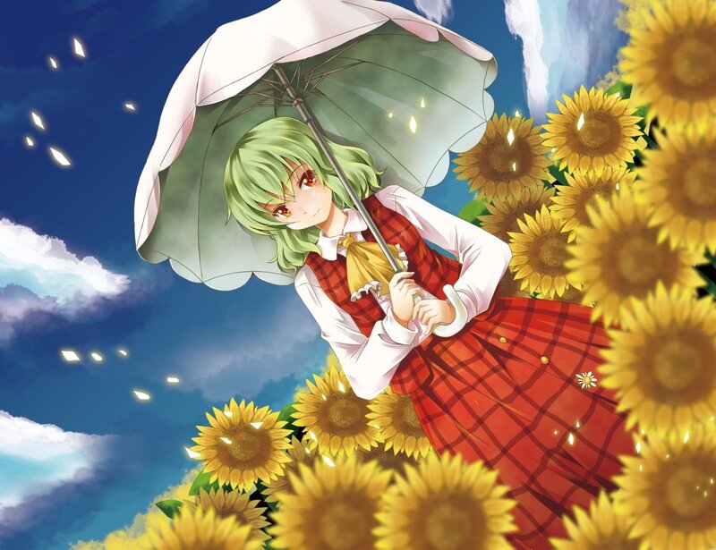 Girl with umbrella in sunflower field